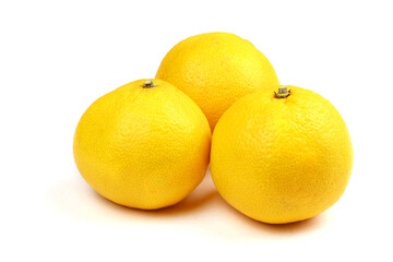 Yellow Tangerines isolated on a white background. Fruits. Healthy food