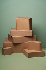 Stack of cardboard boxes on pastel color background with copy space
