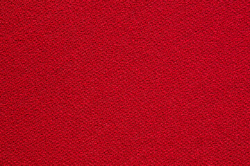 Red fabric cloth texture background close up