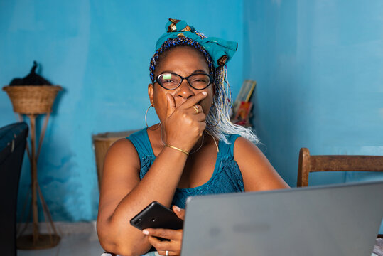 Close Up Of A Mature African Woman With Laptop.