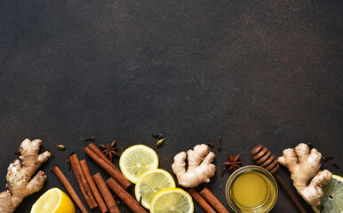 Tea with lemon, honey and cinnamon. Ingredients for making tea. Hot winter drink with ginger and sea buckthorn.