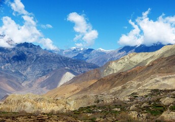 Majestic Himalayan mountains range in Mustang district, Nepal. Awesome Annapurna mount. Impressive cloudscape.