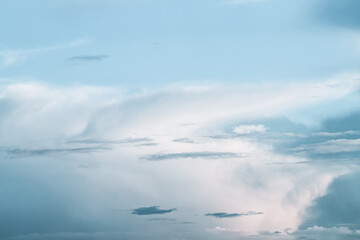 Bright blue evening sky with big cloud for peaceful background or wallpaper