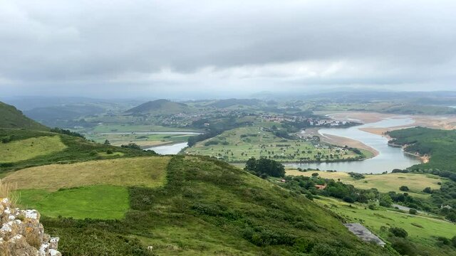 Panoramic view of the mouth of the river Pas from La Picota in Cantabria, Spain