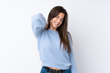 Fototapeta premium Teenager girl over isolated white background with neckache