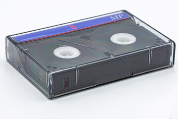 old 8mm magnetic tape on white background