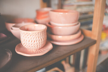 Pottery vases and cups.Top horizontal view copyspace