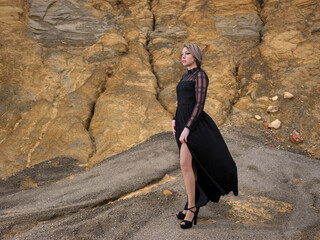 Young woman posing with party dress