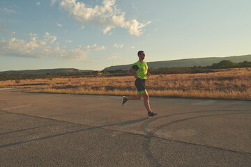 Obraz premium triathlon athlete running on morning trainig