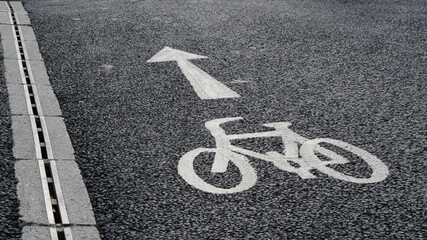 Bicycle lane sign on asphalt