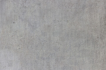 Rough uneven surface of the plastered wall.