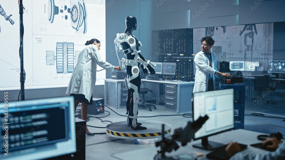 Leinwandbilder in robotics technology development laboratory diverse team of engineers work on a bionics exoskeleto