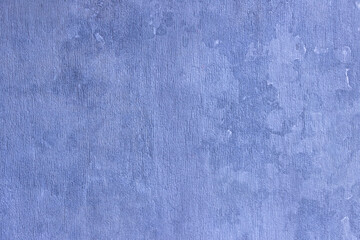 Rough uneven surface of the plastered wall.