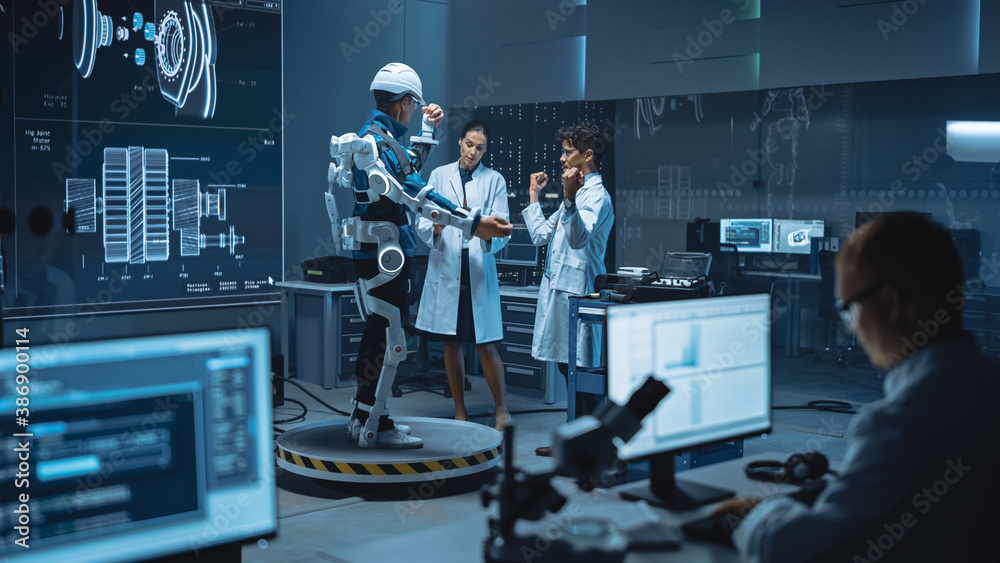 Leinwandbilder in robotics development laboratory: engineers and scientists work on a bionics exoskeleton prototype