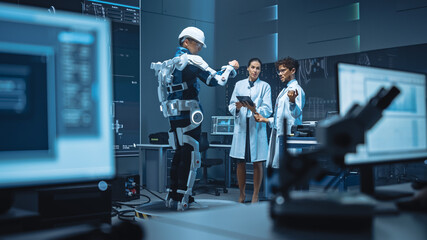 In Robotics Development Laboratory: Engineers and Scientists Work on a Bionics Exoskeleton...