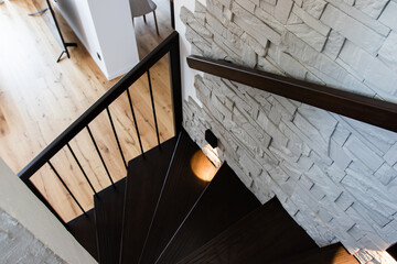 dark wooden staircase in stylish design, modern work
