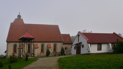 Fototapeta na wymiar built in 1686, a gothic Catholic church dedicated to Saint Joseph in the village of Ruszkowo in Warmia and Masuria in Poland