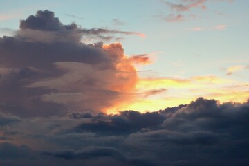Fototapeta premium Colorful stormy clouds as background