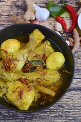 Opor ayam, chicken cooked in coconut milk from Indonesia, from Central Java, added with boiled eggs. Popular dish for lebaran or Eid al-Fitr