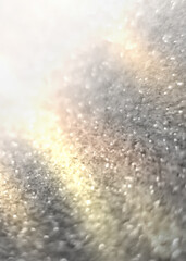 Dark blurred abstract background, bokeh. A flash of blurry lights. Reflection of city lights on the asphalt. Dark Christmas background.