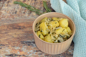 Boiled potato with onion, garlic and rosemary