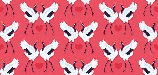Seamless pattern with pair of red crowned cranes and heart. Repeating red background with dancing East Asian birds. Love and romance. Valentine's day design. Wallpaper, fabric, wrapping paper. Vector