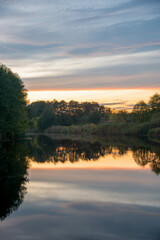 Obraz premium sunset over the river
