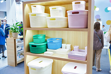 Plastic household containers in store