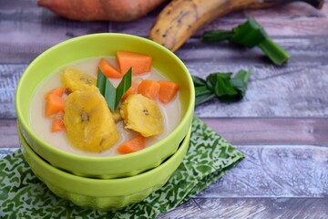 Indonesian Food - Kolak Pisang Ubi, Plantain banana and sweet potato, cooked in coconut milk, palm sugar and pandanus leaves