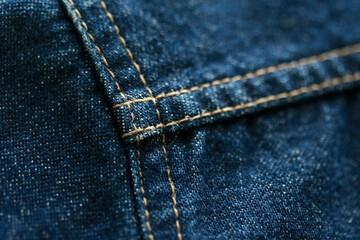 Fototapeta premium Jeans denim texture close up , focus only one point , soft blured background wallpaper
