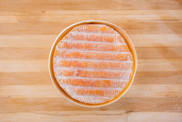 Delicious traditional German cheese close-up during cooking. To make a cheese