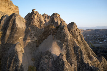 Unique geological formations at Cappadocia, Turkey. Cliffs cave dwellings carved into the stone formations.