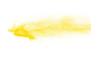 Freeze motion of yellow color powder exploding on white background. 