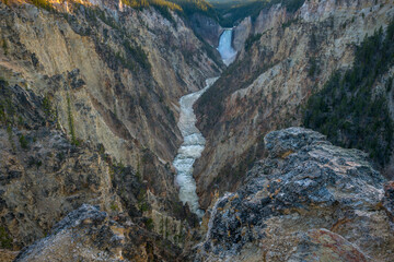 lower falls of the yellowstone national park from artist point at sunset, wyoming, usa