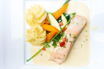 french cuisine dish with tomato and salmon