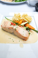 french cuisine dish with tomato and salmon