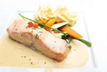 french cuisine dish with tomato and salmon