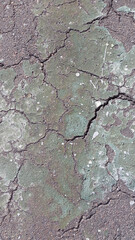 Cracked surface. Vintage background with cracks. Cracks and stains