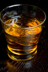 Cocktails. Traditional American drinks made by artisanal bartenders or mixologists in speakeasy & upscale bars or dives or taverns.Cocktails served in chilled cocktail glasses & garnished with fruit.