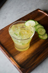 Cocktails. Traditional American drinks made by artisanal bartenders or mixologists in speakeasy & upscale bars or dives or taverns.Cocktails served in chilled cocktail glasses & garnished with fruit.