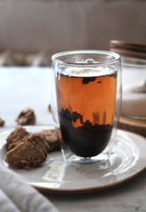 Cosy homemade oatmeal cookies and a cup of tea.