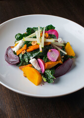 Beet Salad. Classic American restaurant or French bistro salads, kale, lettuces, almonds, blueberries, walnuts, heirloom tomatoes, bacon, blue cheese, avocado, hard boiled eggs tossed w/ olive oil.