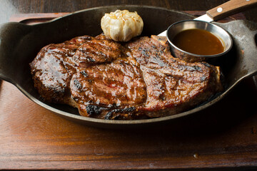 Steak. Bbq Steaks. Grade A grass fed angus beef steaks. Tenderloin, filet mignon, New York strip, bone in rib-eye grilled medium rare on wood-fired grill. Classic American steakhouse entree favorite.