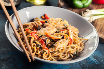 Chicken chow mein. Fried noodles with chicken and vegetables