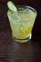 Margarita. Classic traditional Mexican cocktail. Made with Blanco tequila, fresh lime juice, agave syrup and orange juice. Served in salt rimmed tumbler over ice and garnished with a lime.