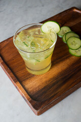 Margarita. Classic traditional Mexican cocktail. Made with Blanco tequila, fresh lime juice, agave syrup and orange juice. Served in salt rimmed tumbler over ice and garnished with a lime.