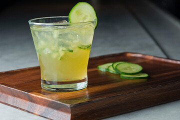 Margarita. Classic traditional Mexican cocktail. Made with Blanco tequila, fresh lime juice, agave syrup and orange juice. Served in salt rimmed tumbler over ice and garnished with a lime.