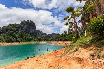 Foto op Canvas Beautiful mountains lake river sky and natural attractions in Ratchaprapha Dam at Khao Sok National Park, Surat Thani Province, Thailand. © Southtownboy Studio