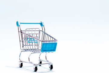 Shopping cart on white background. Copy Space. Shopping concept.