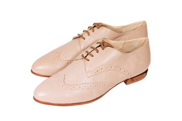 Woman beige leather shoes with low heel isolated on the white background. Side view